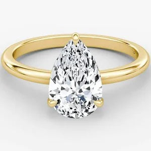 gold pear cut engagement ring