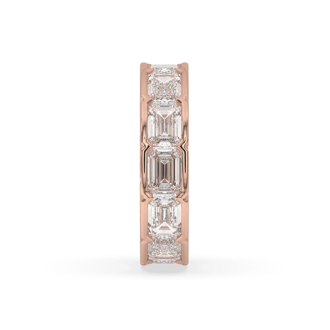 East-West bezel set emerald cut