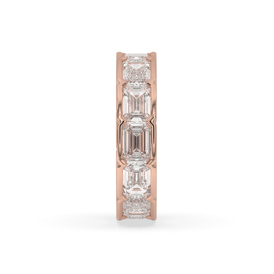 East-West bezel set emerald cut