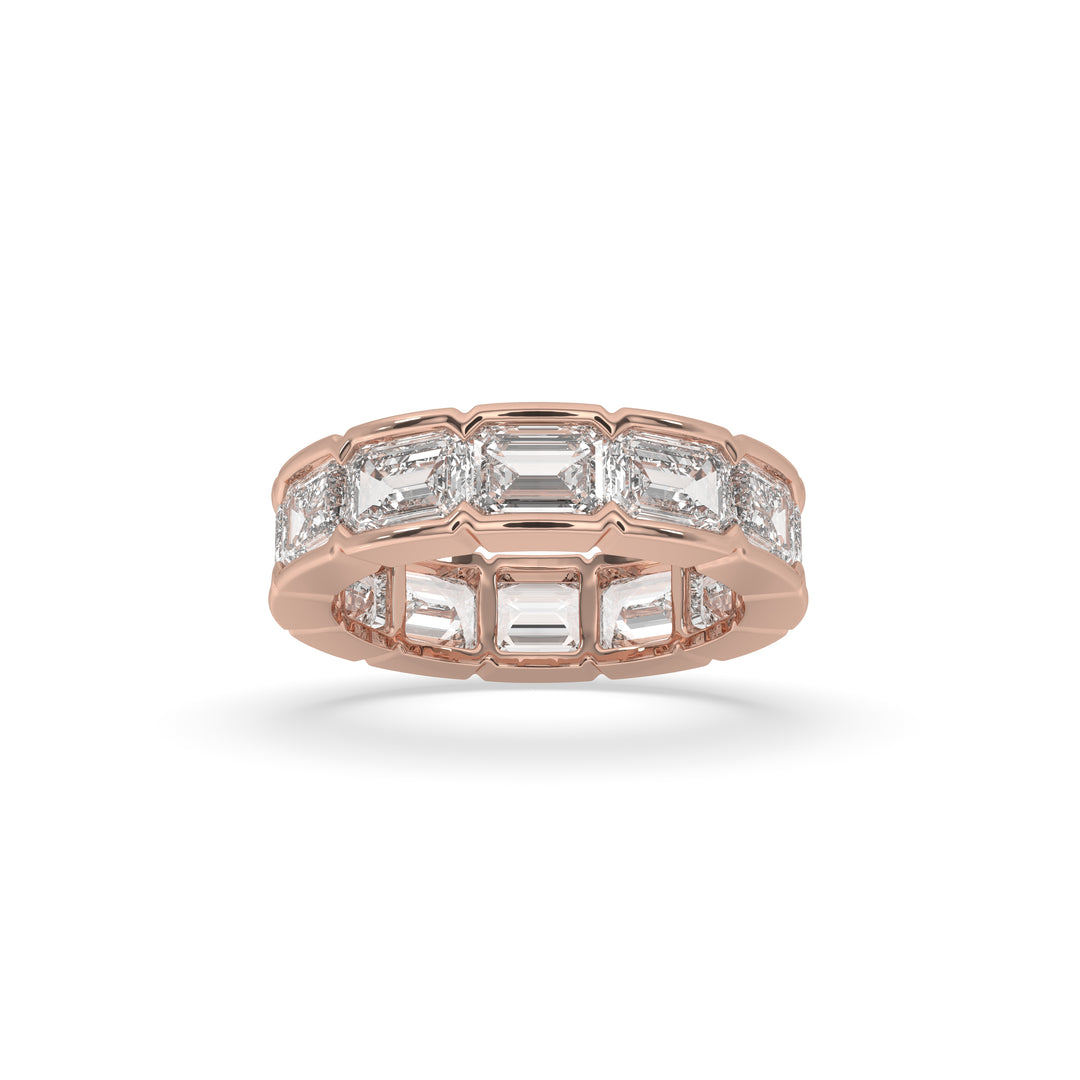 East-West bezel set emerald cut