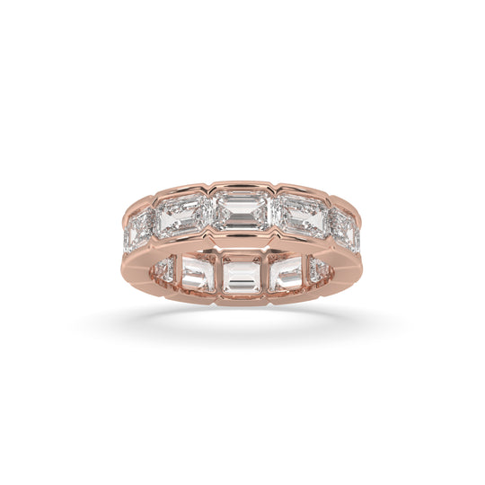 East-West bezel set emerald cut