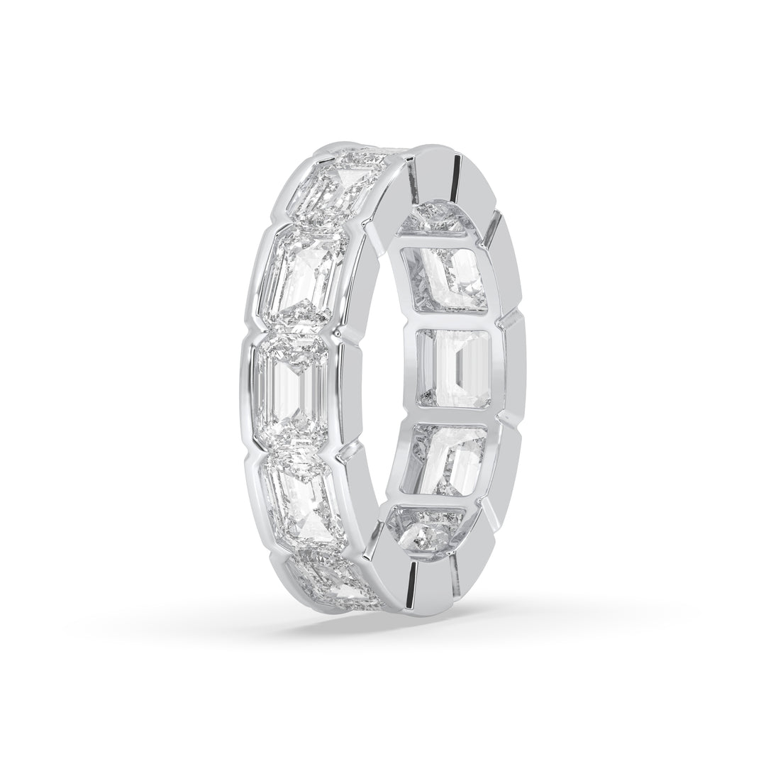 East-West bezel set emerald cut