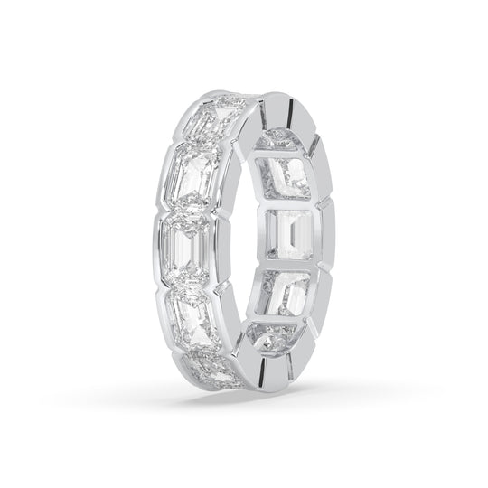 East-West bezel set emerald cut