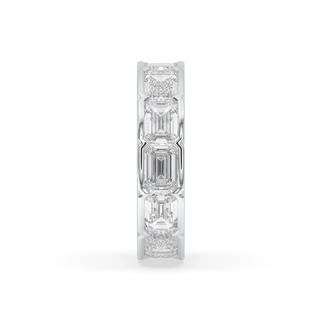 East-West bezel set emerald cut