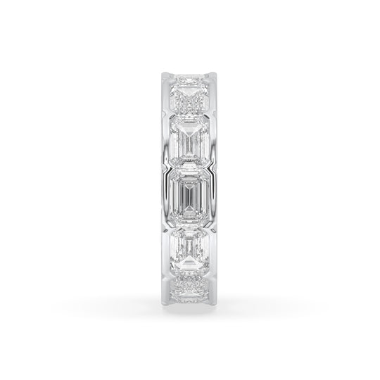 East-West bezel set emerald cut