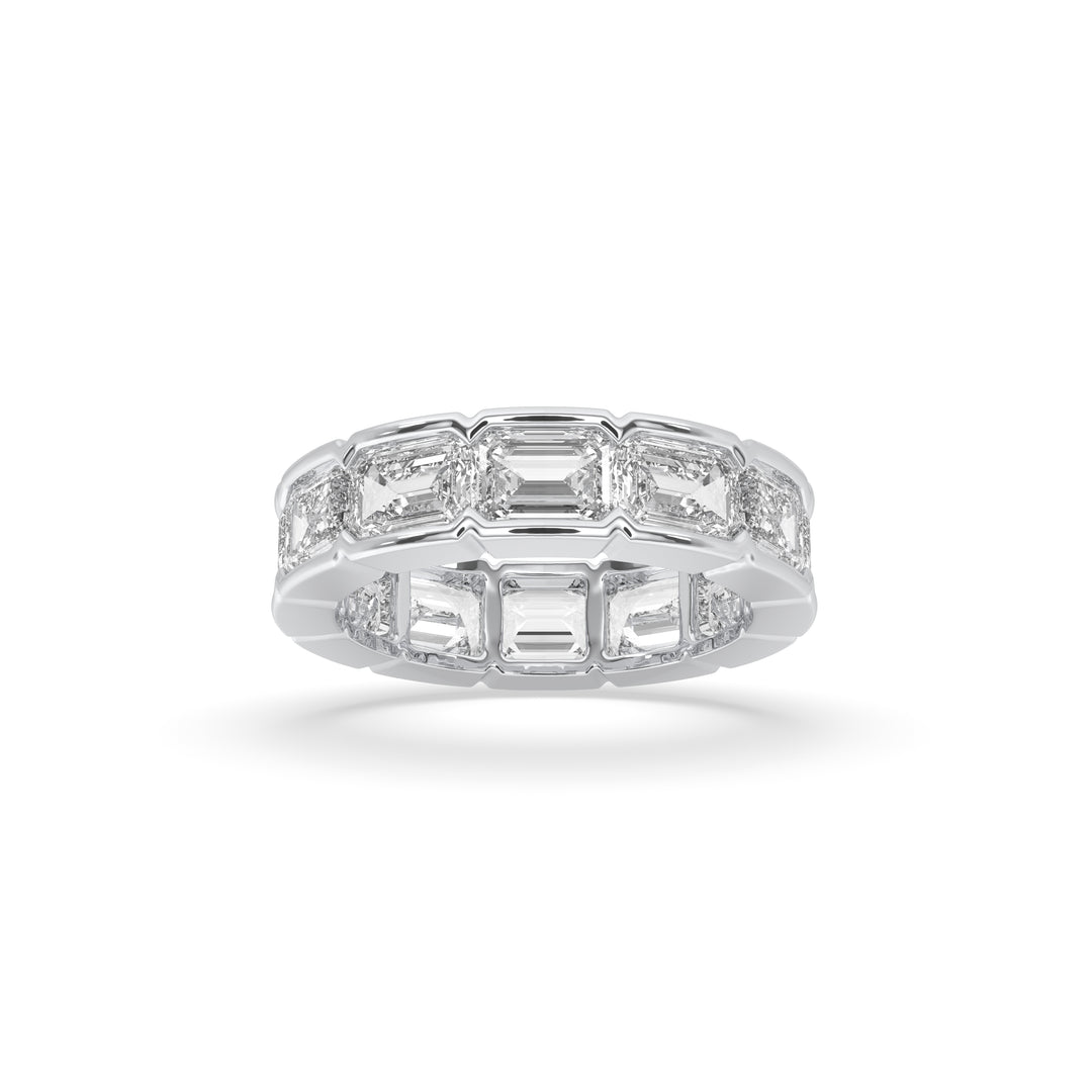 East-West bezel set emerald cut