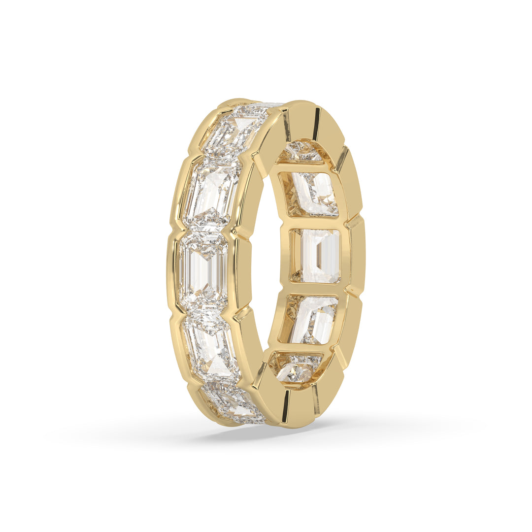 East-West bezel set emerald cut
