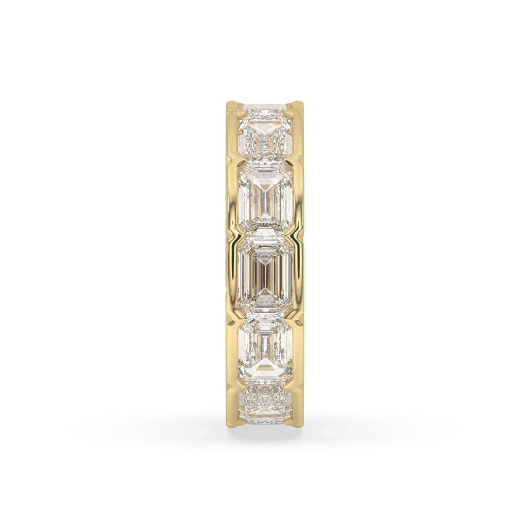 East-West bezel set emerald cut