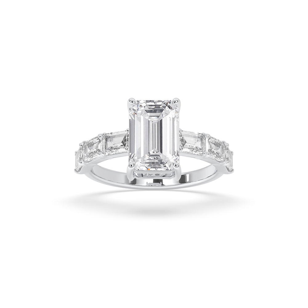 Soliatiare Emerald Ring with side Emerald