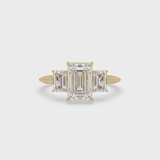 Emerald Cut Three Stone Engagement Ring